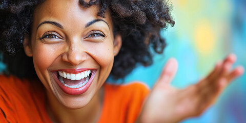 Happy Teacher: A woman with a bright smile, gesturing with her hand.