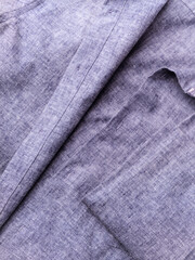 Close up of men's linen shirt. Soft focus.	