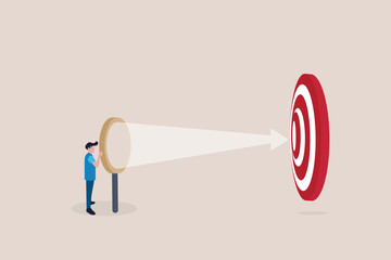 Businessman with magnifying looking up target or goal. concept of Search for business target or goal, opportunity, mission to achieve, discover purpose or find strategy to reach goal