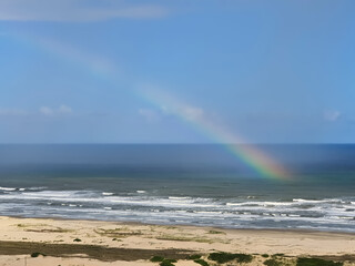 arco-íris sobre o mar