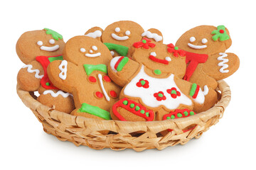 christmas gingerbread cookie in a wicker basket isolated on white background
