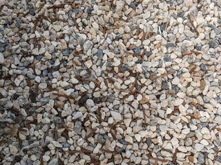 Background of grey and white gravel stones. Texture background