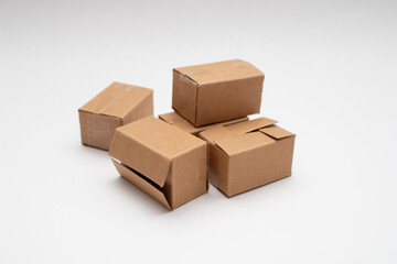 Stack of cardboard boxes delivery service on white background