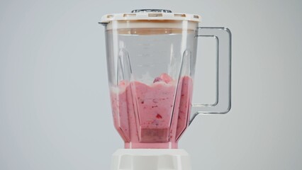 Pieces of ripe bananas, kiwi and strawberries are mixed in a blender with milk.
