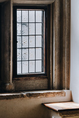 Fototapeta premium window with muntins in a medieval castle