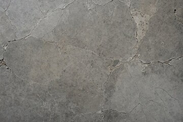 Obraz premium Grey Cement Concrete Floor Grunge Background, Wall Texture used as Wallpaper for Text Copy and Space, Marble Design for Ceramic Wall and Floor Tiles, Old Plaster Textures with Scratches and Cracks