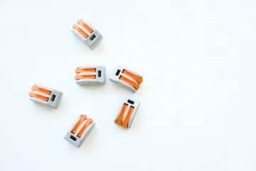 Quick wiring cable connectors for electrical installations isolated on white background. Terminals for quick connection. Wire splice connectors. Electric clamps for industry work. Copy space available
