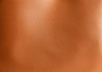 Orange leather, closeup view of material texture