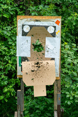 Cardboard target at a shooting range.