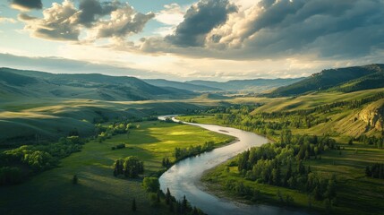 River Winding Through a Lush Valley Under a Cloudy Sky