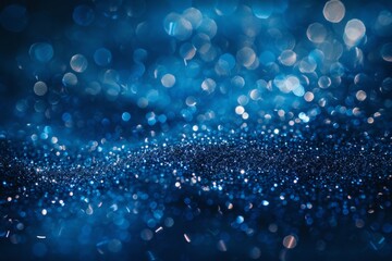 Blue glitter creating a magical bokeh effect with sparkling lights