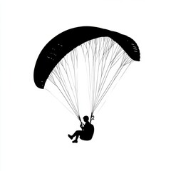 Silhouette of a paraglider soaring through the sky on a clear day
