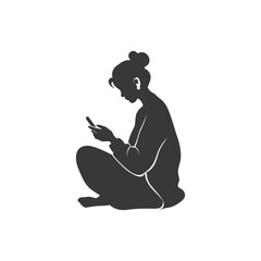 Silhouette of a woman sitting and using a phone