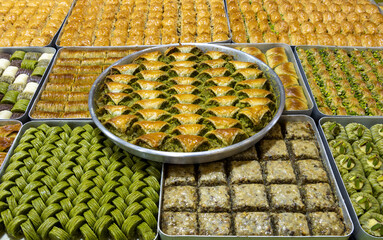 Baklava dessert with pistachios in a tray