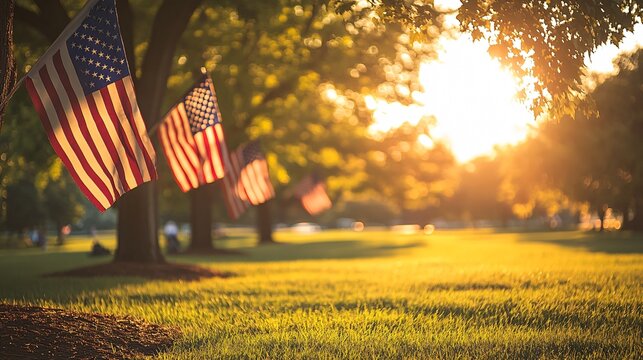 Labor Day background with a row of American flags flying over a green, sunlit park, where families gather for picnics and celebrations