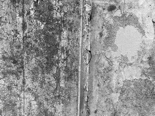 劣化が進んだコンクリート壁。築60年の建物の壁。
