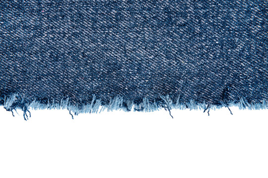 Piece of torn denim on a white background. Denim texture