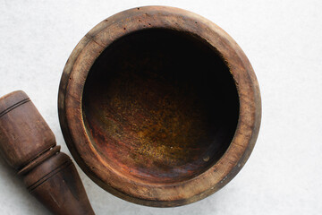 Overhead view of wooden mortar and pestle, top view of native wood mortar and pestle