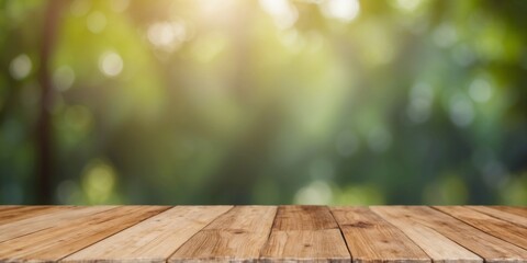 wooden table with blur green nature background for display product.