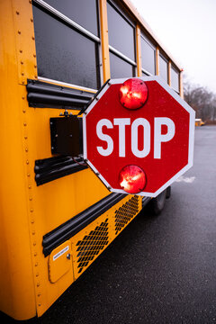 School bus stop sign Flashing
