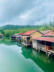 Fototapeta premium Traditional Fishermen’s Houses on Stilts in a Small Village on Koh Rong, Cambodia