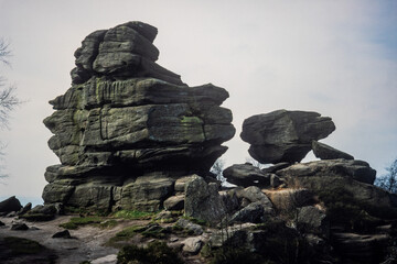 Vintage photograph of a weathered rock formation in the English countryside