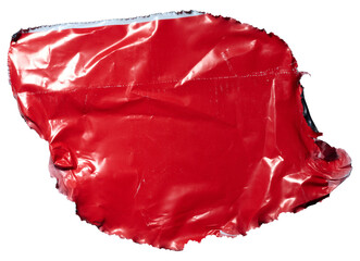 Torn piece of red polyethylene on isolated background, close up