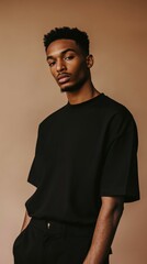 Fototapeta premium Fashion model poses in minimalist attire against a warm backdrop