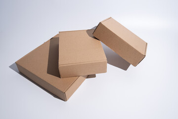 Brown paper box. Cardboard box isolated on white background. Place for text. Gift box