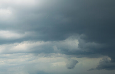 sky covered by intense dark cumulonimbus clouds