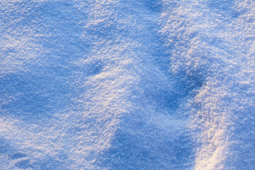 Surface of pure white snow with bumps.Winter image.