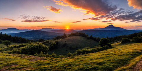 Orange Sky Over Tranquil Mountain Peaks at Sunset