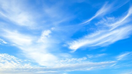 Fototapeta premium Serene Sky with Wispy Clouds