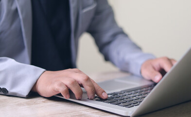 Document management, paperless office Businessman signing e-document on digital tablet, virtual notepad on virtual screen, online contract signing with application
