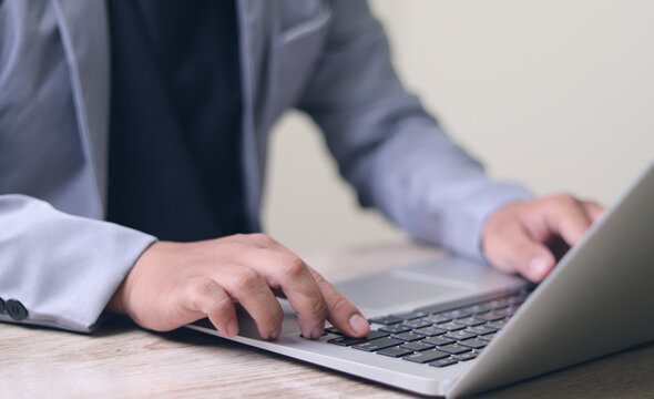 Document management, paperless office Businessman signing e-document on digital tablet, virtual notepad on virtual screen, online contract signing with application