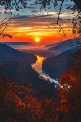 Naklejka premium Vibrant sunset over winding river in autumn landscape during twilight