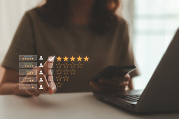 Customer service experience and satisfaction survey concept. Close up of a woman customer giving a five star rating on smartphone. Using technology for Review, Service rating, and Satisfaction.
