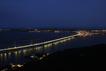 chain bridge at night