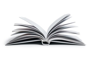 Obraz premium An open book on a white surface, perfect for academic or literary themed projects