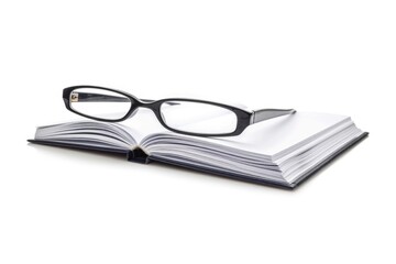 A pair of glasses resting on the cover of an open book, perfect for a study or reading scene