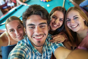 Fototapeta premium Group of friends taking a photo together in front of a pool table, social gathering atmosphere