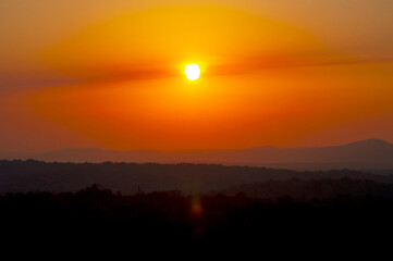 Sunset, panoramic view in the Guatemalan rainforest, relaxed and pollution-free space, Tikal National Park.