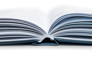 Fototapeta premium A single open book lying on a clean white surface