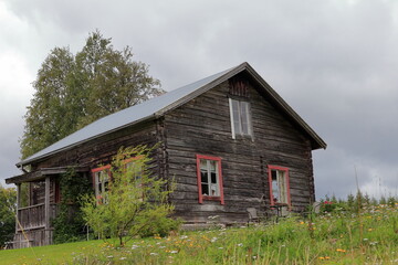 Obraz premium Building or wooden cabin at the Swedish countryside. August 2024. Jämtland, Sweden, Europe.
