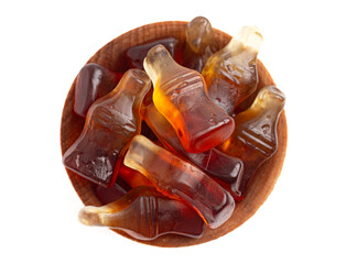 A Bowl of Gummy Cola Bottles Isolated on White Background