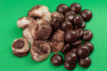 Crisp Freeze Dried Chocolate Covered Cream Filled Mint Candy on a Green Background