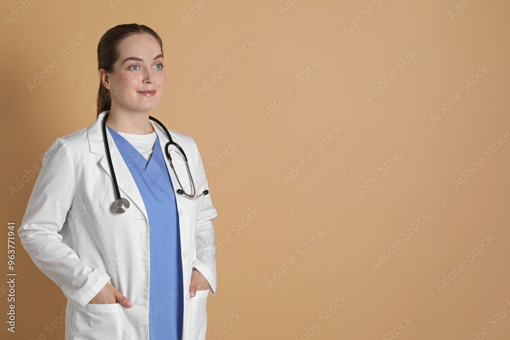 Canvas Prints Portrait of professional nurse on dark beige background. Space for text