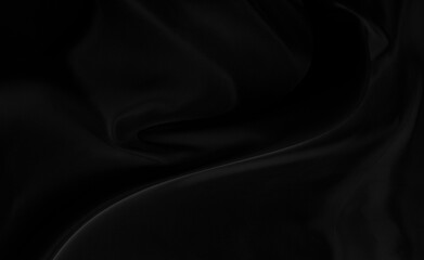 Black gray satin dark fabric texture luxurious shiny that is abstract silk cloth background with patterns soft waves blur beautiful.