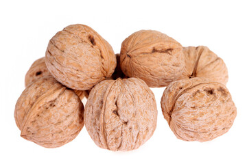 Walnuts are isolated on a white background,