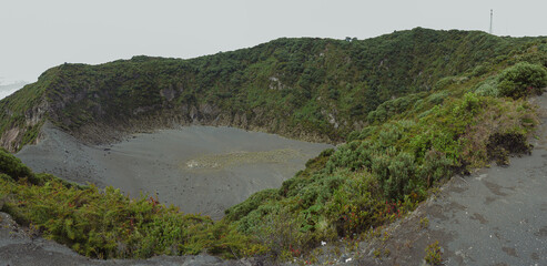 Costa Rican Irazú Volcanic crater with lush green surroundings and terrain